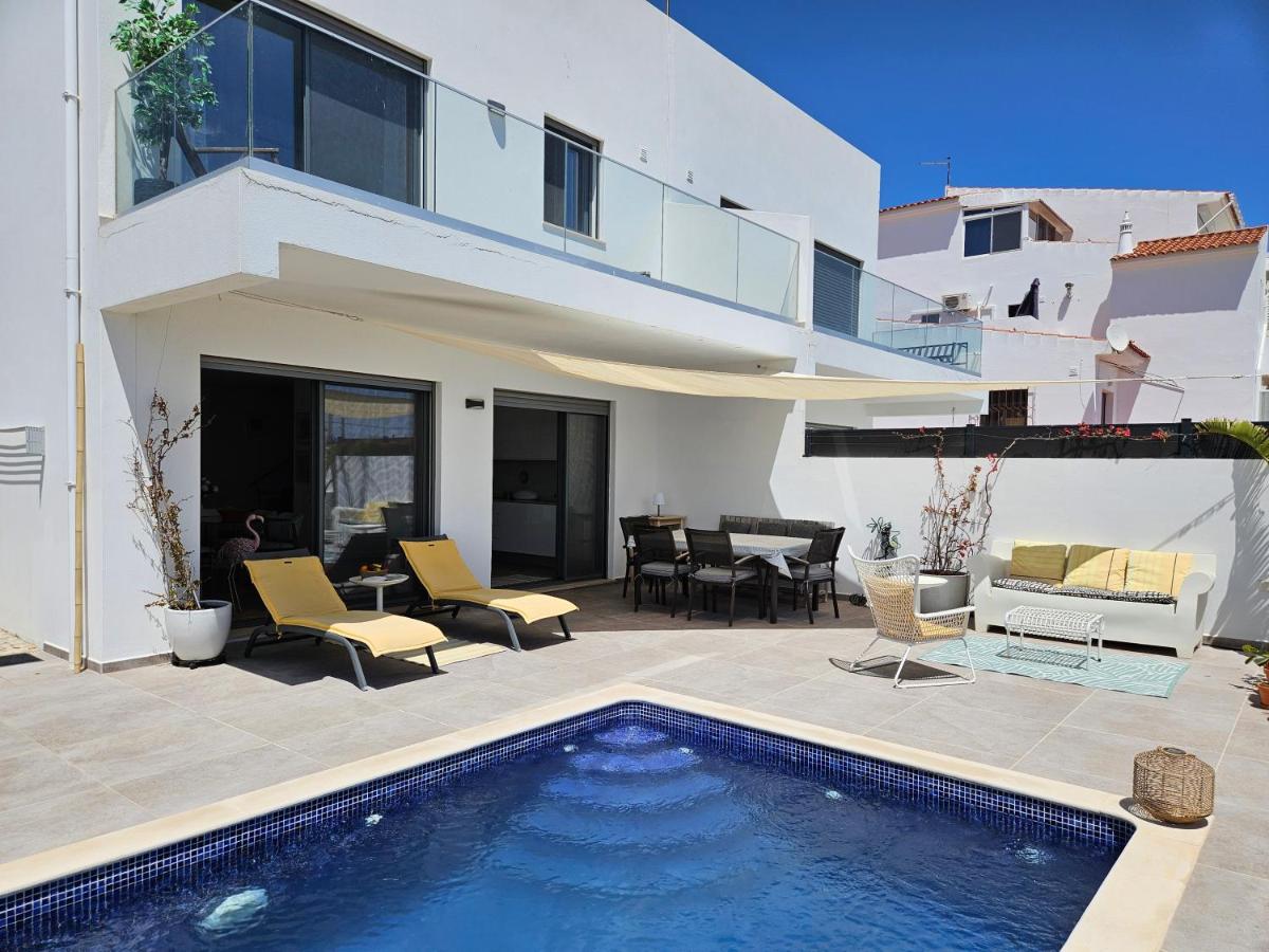 Ria Formosa Beach House, superior modern villa with pool, terrace, beach and sea view